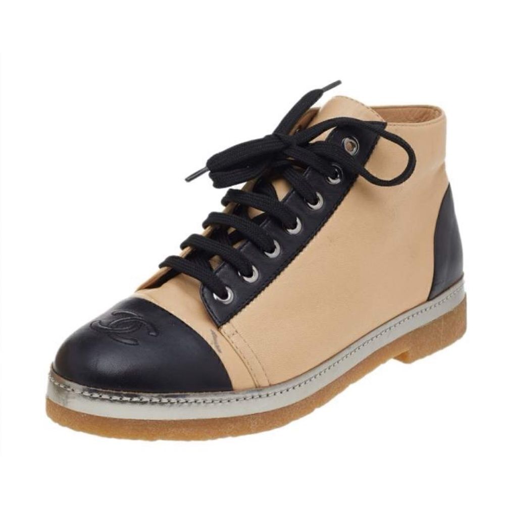 Chanel Calfskin Leather CC
Cap Toe High Top Sneakers Size 39.5 / Pristine